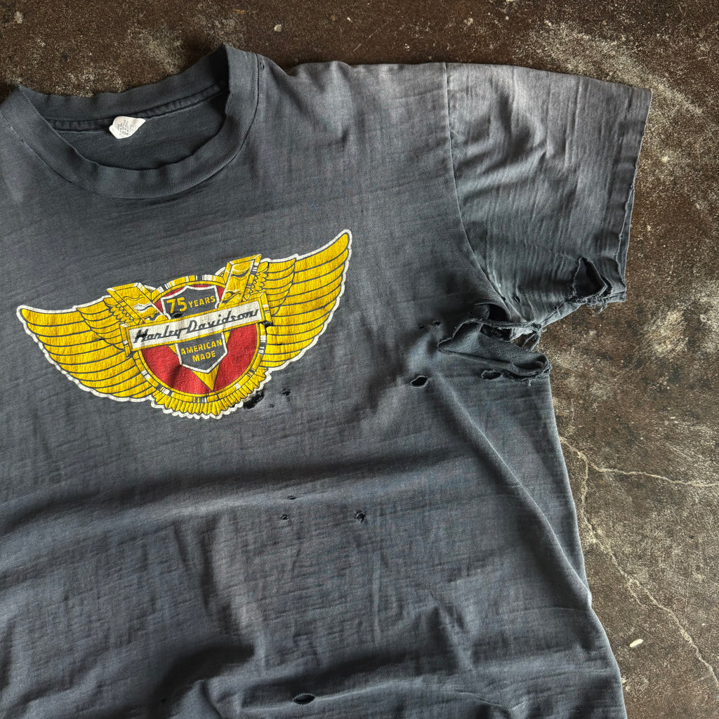 Back view of vintage Harley-Davidson 75 Year emblem thrashed t-shirt