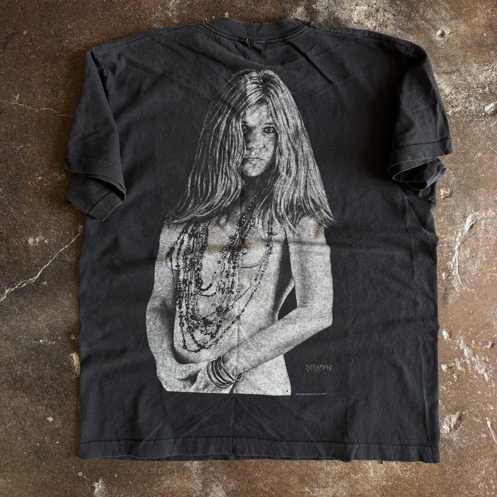Vintage 1990s Janis Joplin black and white portrait t-shirt with beaded necklaces by Bradford Gallery on faded black