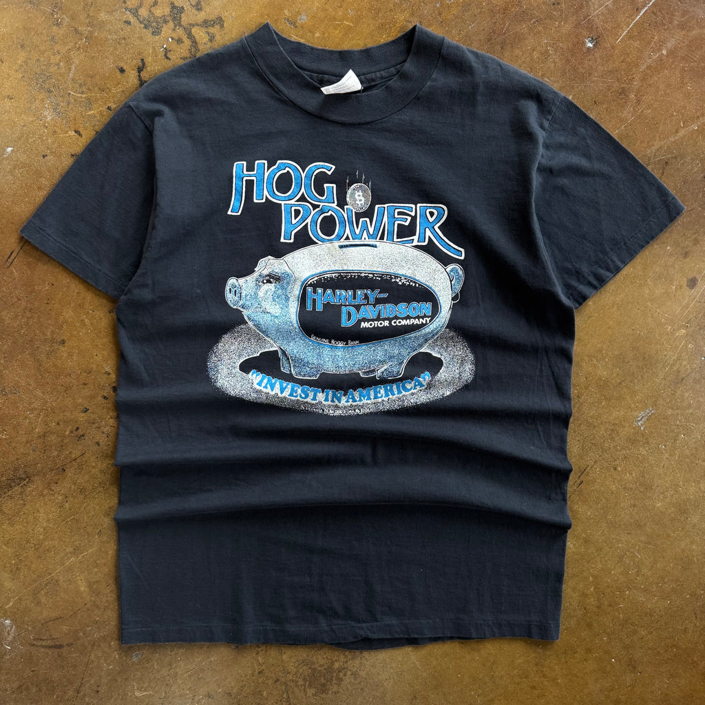 Black short-sleeve t-shirt with red piggy bank graphic and Hog Power text on chest