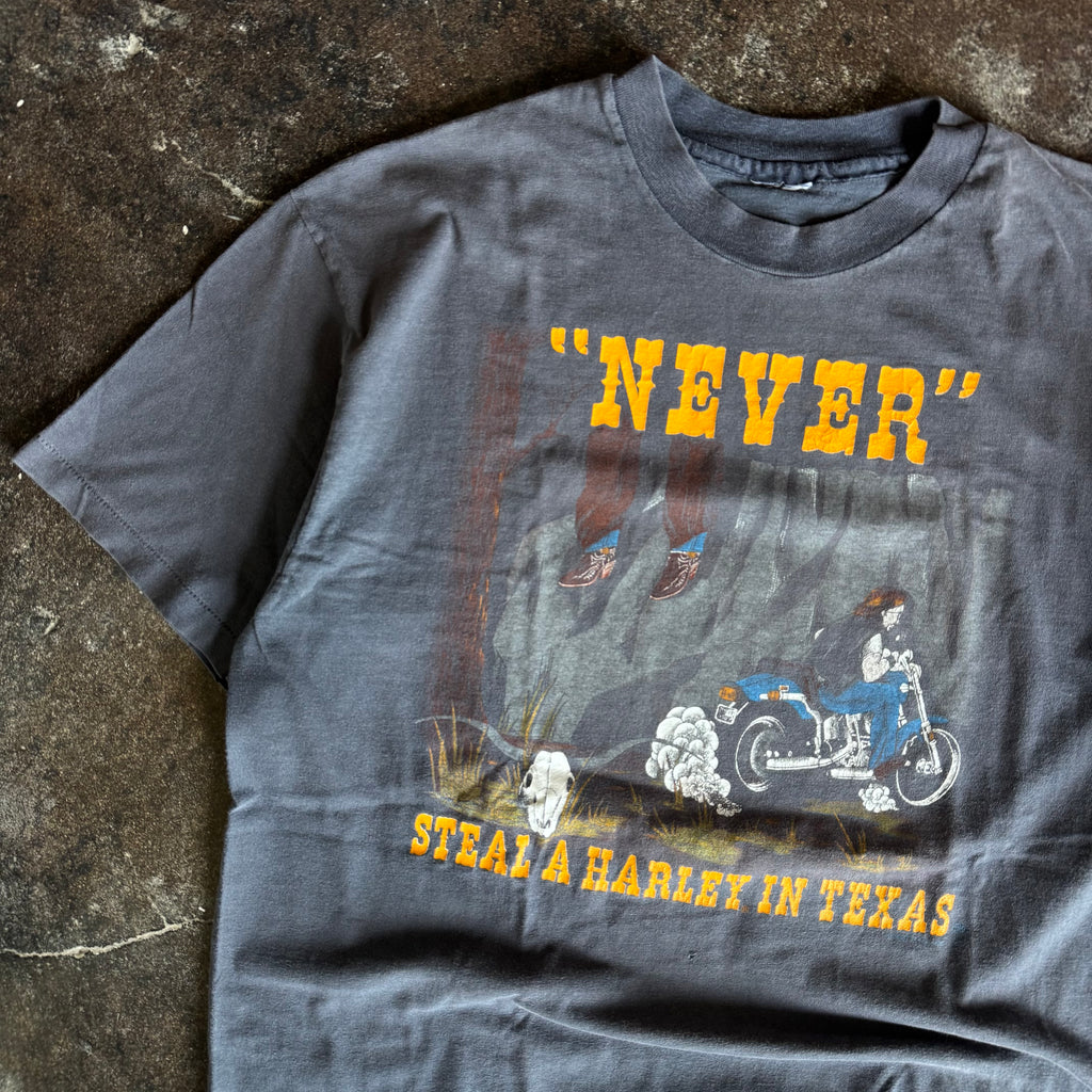 80’s Harley Davidson “Never Steal In Texas” Faded Tee (XL)