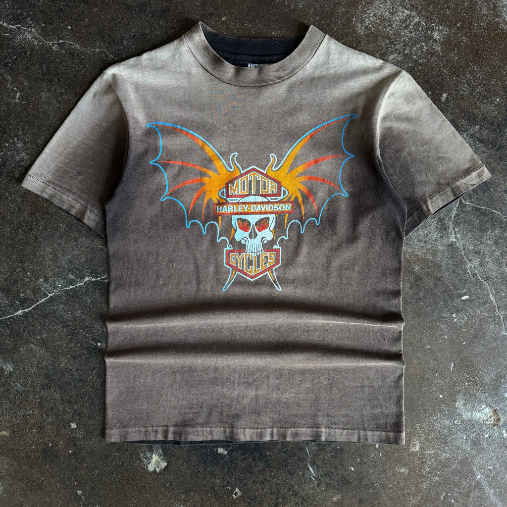 Black short-sleeve t-shirt with orange and red bat-winged skull graphic, Denver CO text on chest