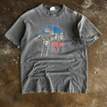 Vintage 1988 Sturgis Rally t-shirt with biker faces on Mount Rushmore and chopper rider on sun faded grey