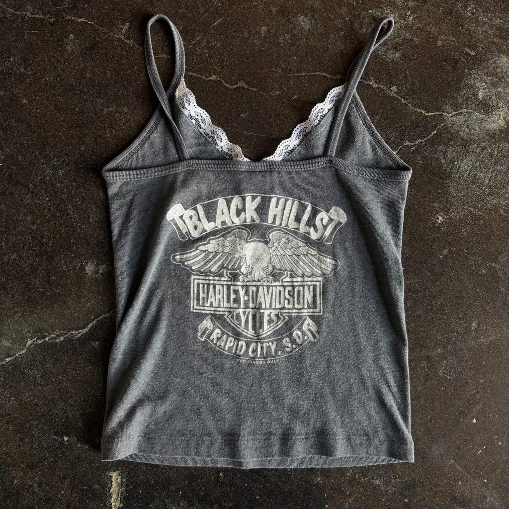 Detail of embroidered Harley Davidson script on vintage womens lace cami