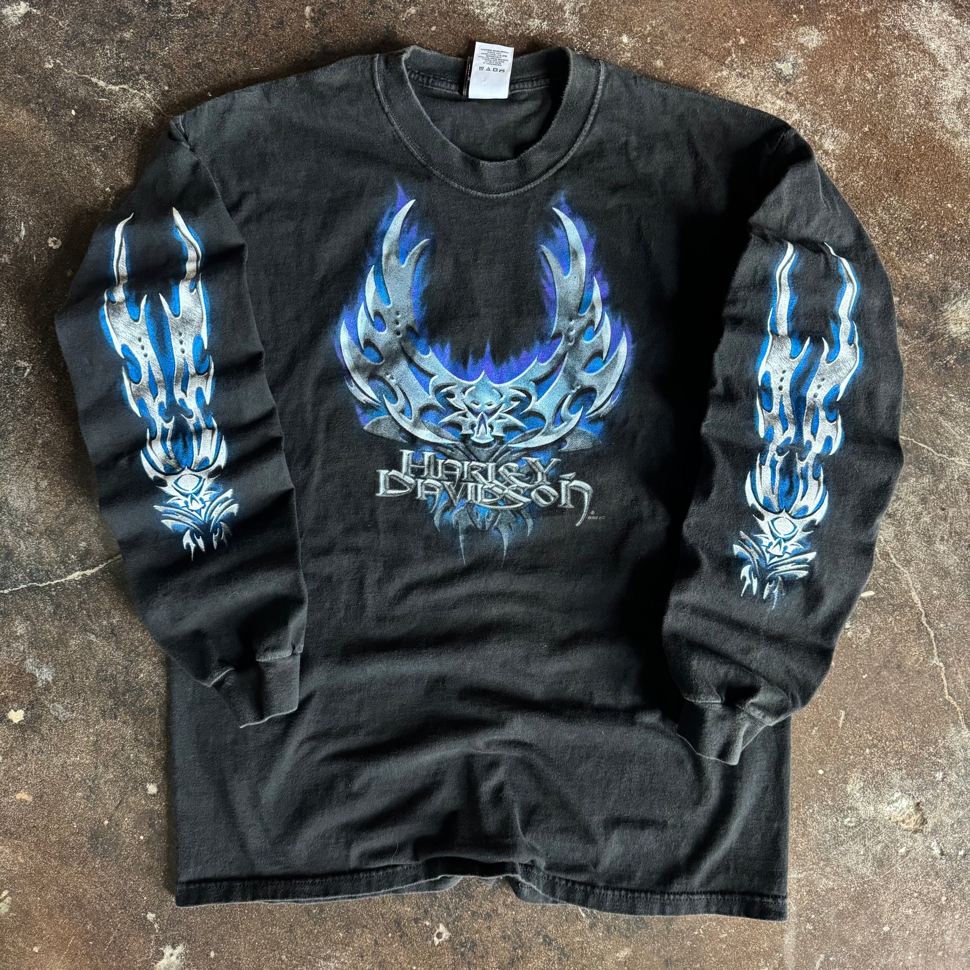 Vintage Y2K Harley-Davidson flaming blades blue chrome longsleeve t-shirt from Ohio with skull and tribal sleeve prints