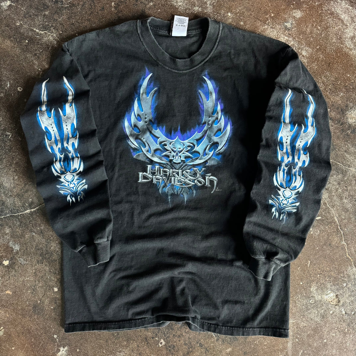 Vintage Y2K Harley-Davidson flaming blades blue chrome longsleeve t-shirt from Ohio with skull and tribal sleeve prints