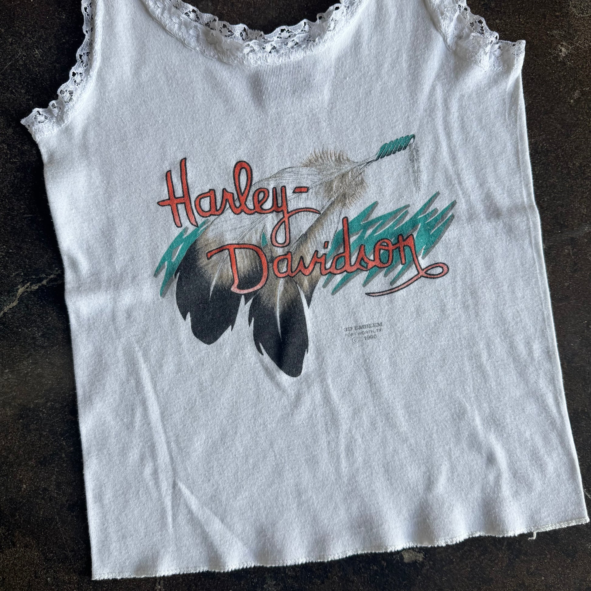 Back view of vintage Harley Davidson womens white feather tank top