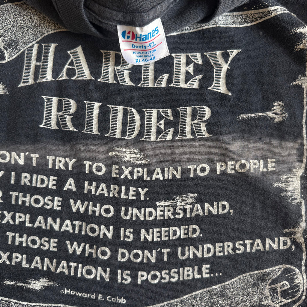Tag detail on vintage 1980s Harley Rider sun faded scroll tee