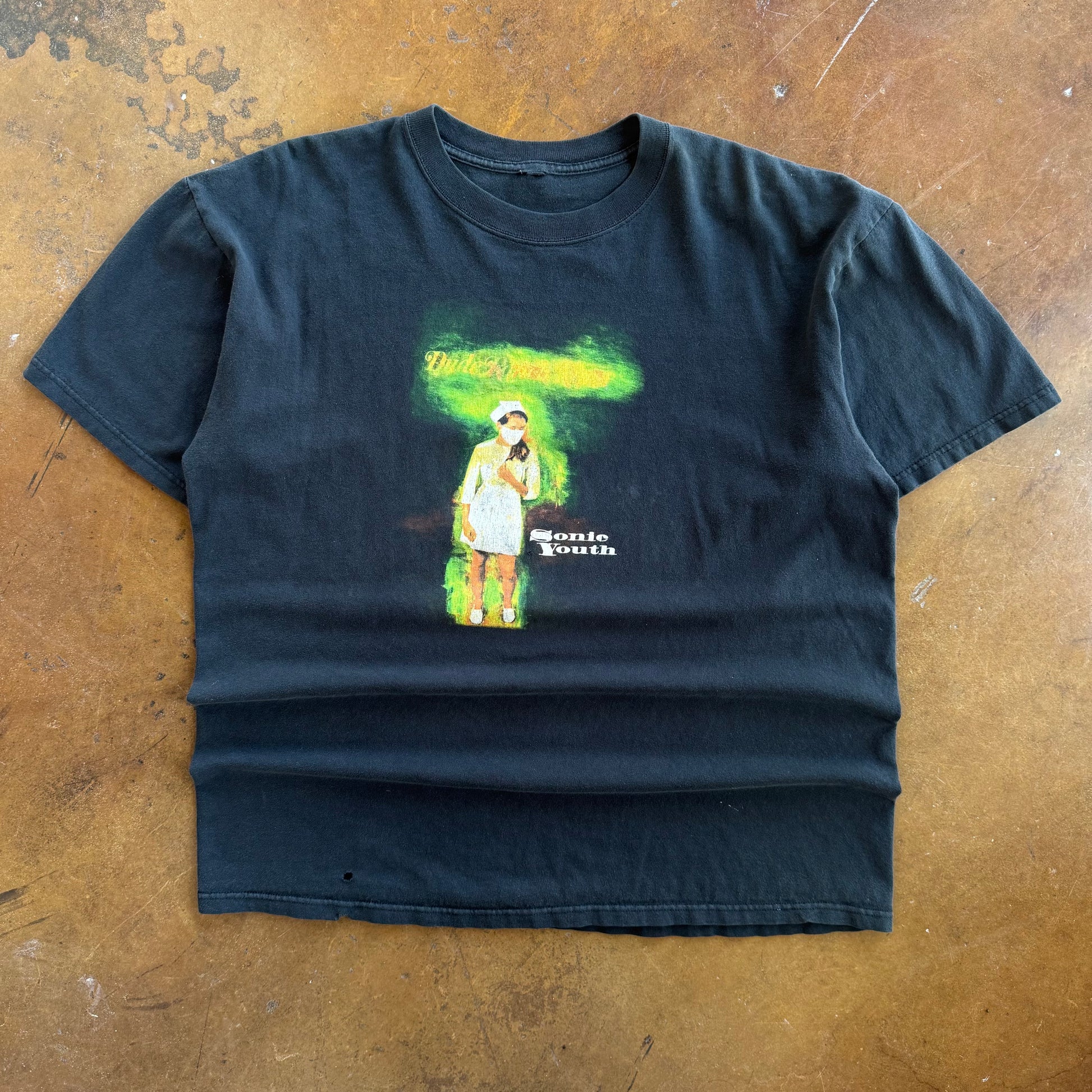 Black short-sleeve t-shirt with Sonic Youth Dude Ranch Nurse band graphic on chest