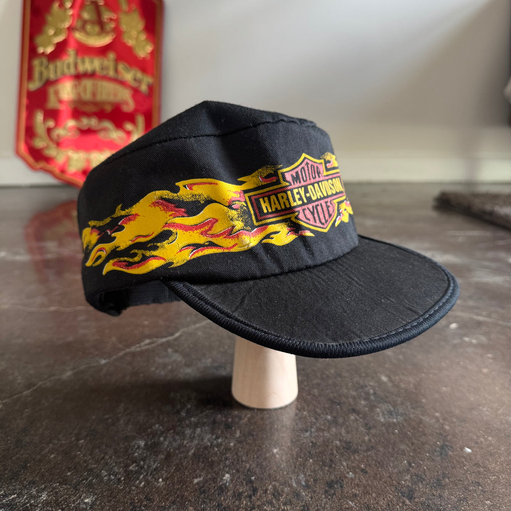 Side view of vintage Harley-Davidson flame painters cap with bar and shield