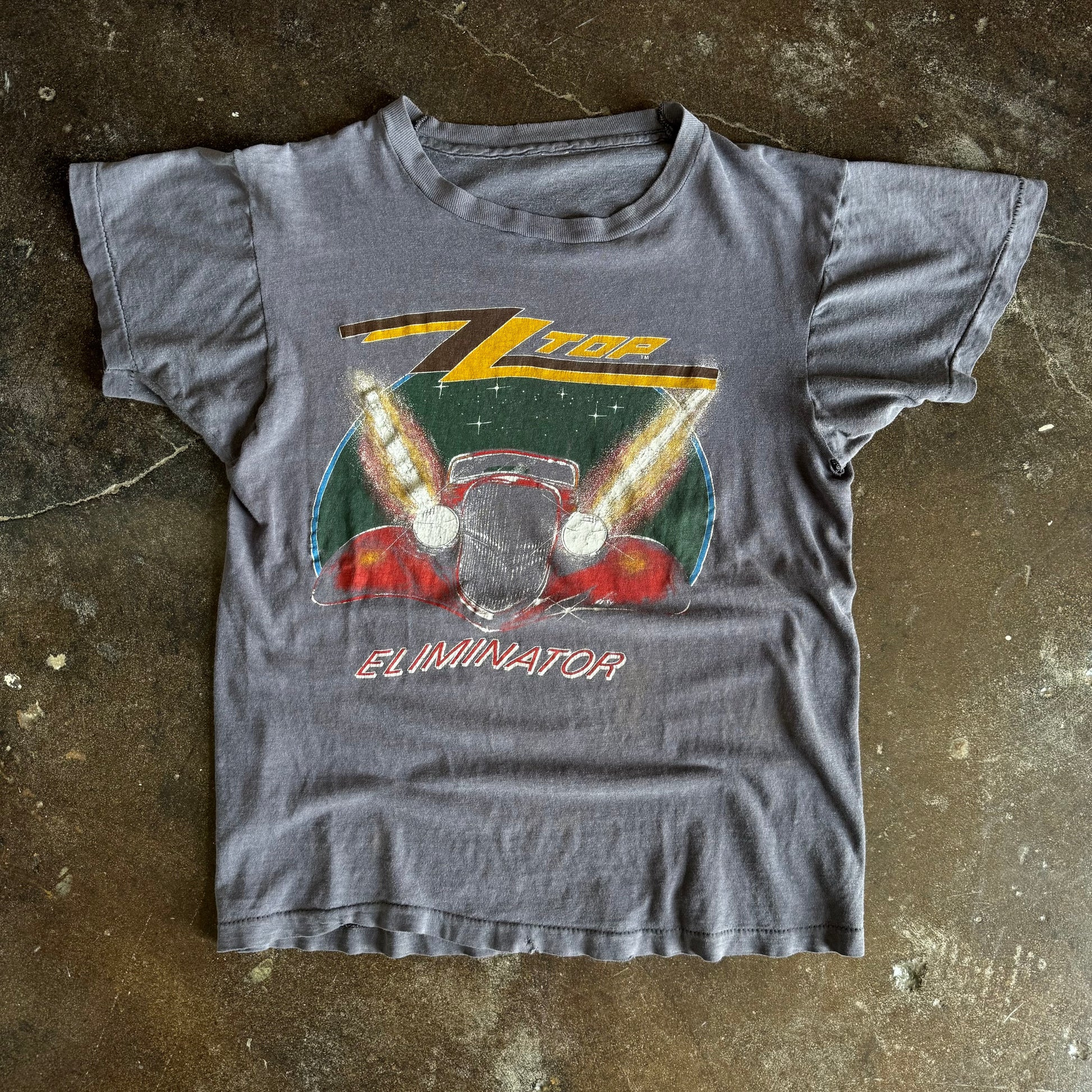 Vintage 1980s ZZ Top Eliminator t-shirt with red hot rod and logo sun faded to grey