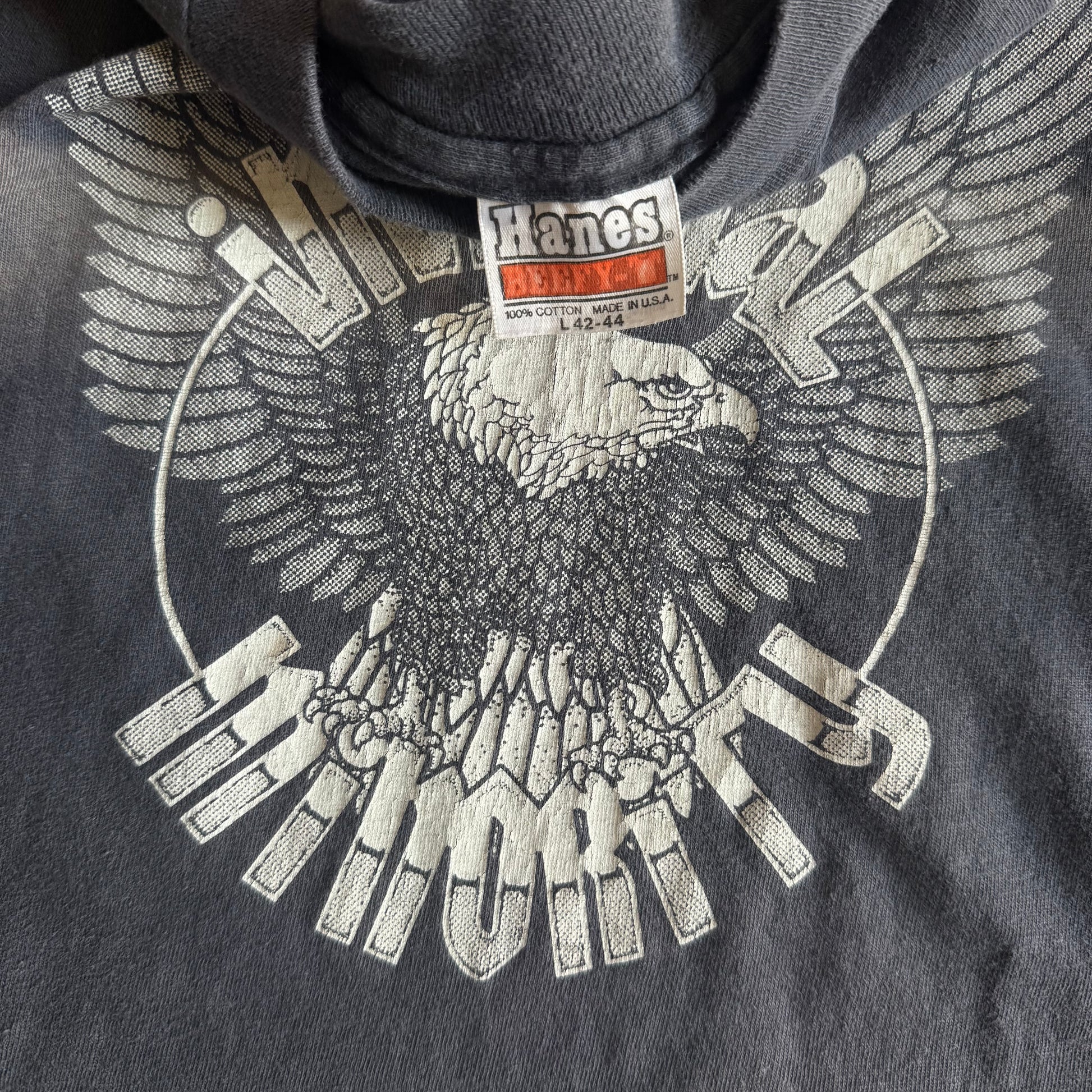 Tag detail on vintage 1980s Harley-Davidson Immoral Minority sun faded tee
