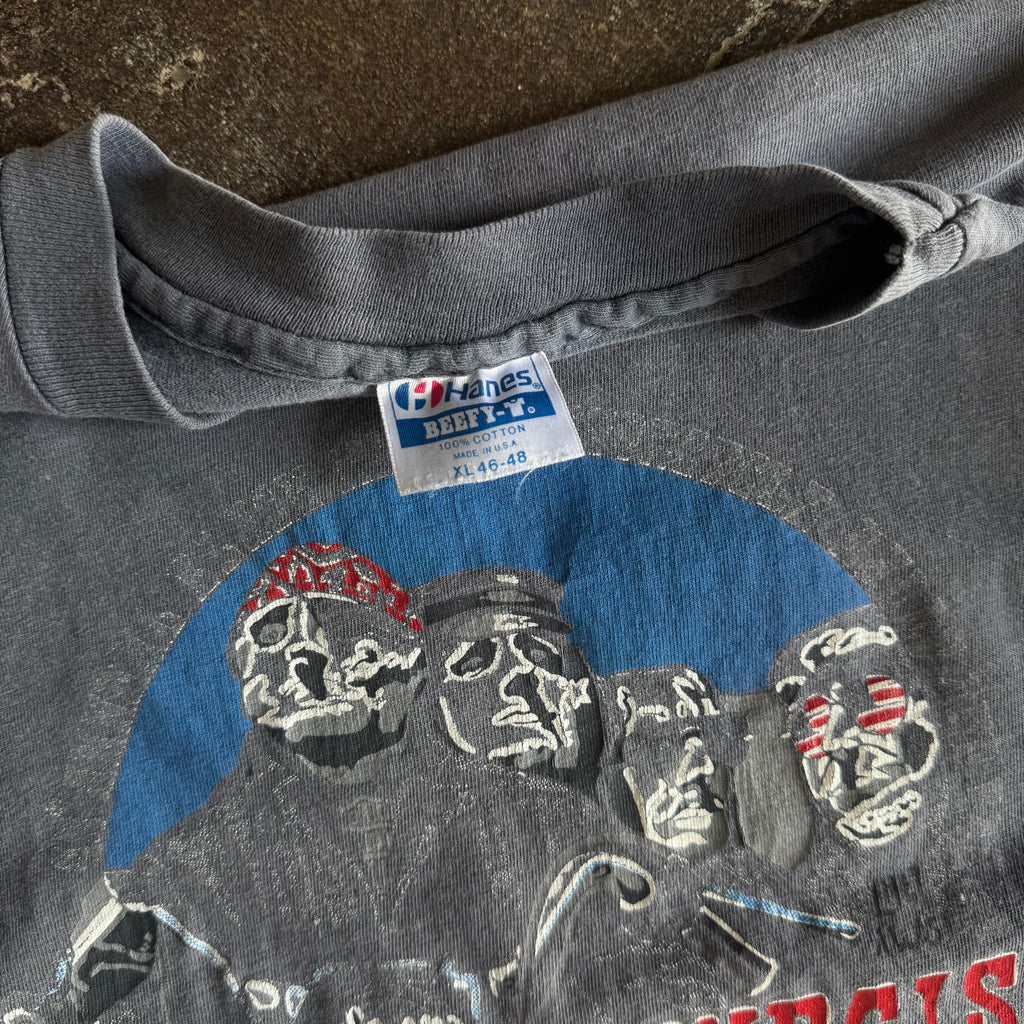 Tag detail on vintage 1988 Sturgis Rally sun faded biker tee