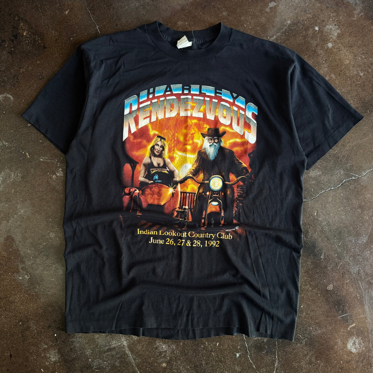 Vintage 1992 Harley Rendezvous Indian Lookout Country Club t-shirt with biker couple on motorcycle and fire background