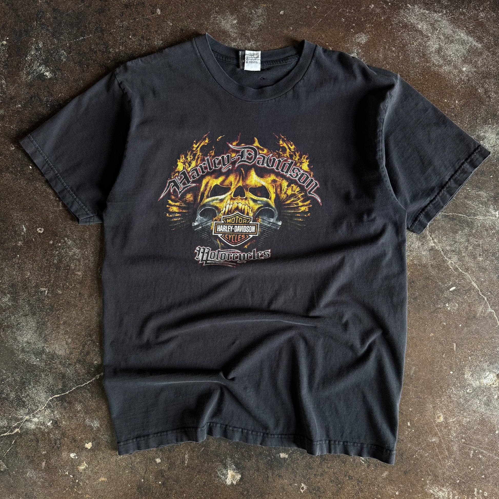 Vintage Y2K Harley-Davidson flaming skull t-shirt from Wisconsin with skull and flame graphic