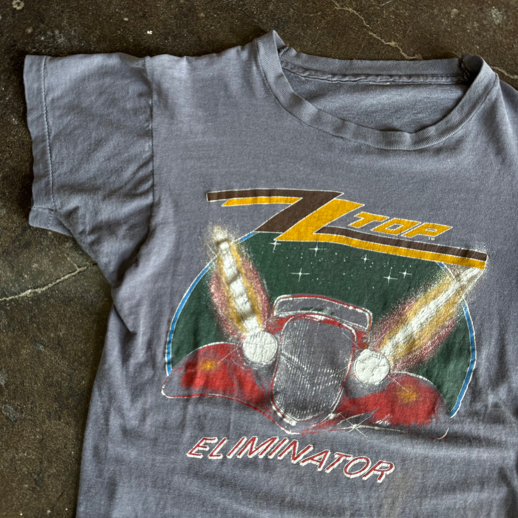 Tag detail on vintage 1980s ZZ Top Eliminator sun faded band tee
