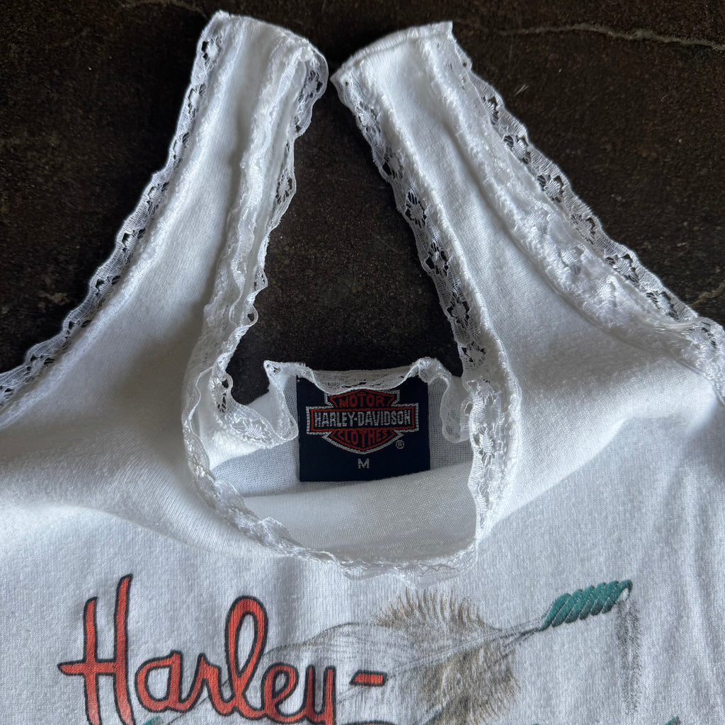 Tag detail on vintage 1980s Harley Davidson womens white feather tank top